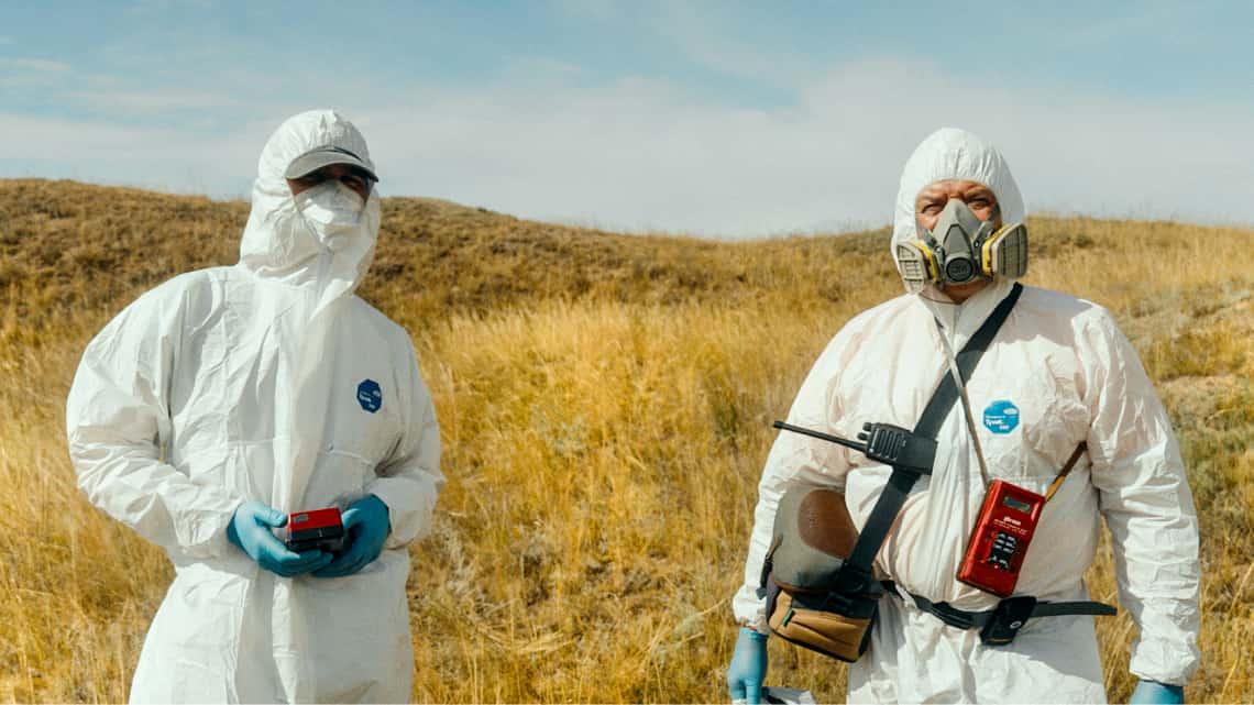 Scientist Dmitry Kalmykov and his colleague wear hazmat suits in Chernobyl