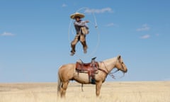 Airborne … a Mexican Charro executes a rope drill on top of his horse.