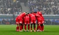 Montpellier players gather in a huddle before the Ligue 1 match against Marseille