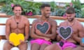 Topless teacher … Kai Fagan, middle, on Love Island.