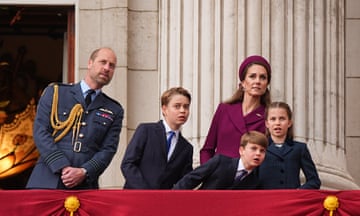 prince and princess of wales and family watch a fly-past at buckingham palace