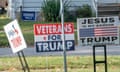 Pro-Trump signs stuck in flat, grassy lawns