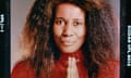 portrait of Alice Coltrane holding her palms together