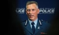 A uniformed Mike Bush speaks to media in his role as New Zealand police commissioner in 2019