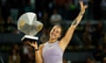 Aryna Sabalenka celebrates with the Madrid open trophy