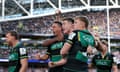 Alex Mitchell, Tommy Freeman and Fin Smith share an embrace at the end of a monumental semi-final which Northampton held on to win.