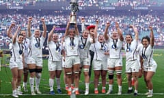 The England captain Zoe Aldcroft lifts the Women’s Six Nations trophy alongside teammates at Twickenham