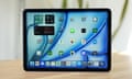 Apple iPad Air M3 review showing the home screen stood up on a table.