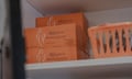 orange boxes on a shelf