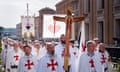Pilgrims dressed in Knights Templar attire parade in St Peter’s Square