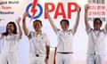 Singapore's prime minister and secretary general of the ruling People's Action Party (PAP), Lawrence Wong, (C-R) waves to supporters with his team