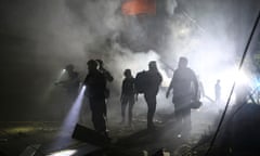 Emergency personnel work at the site of a residential building destroyed by a Russian strike in Zaporizhzhia, Ukraine, on Thursday.