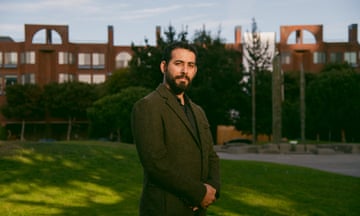 a man looking at a camera