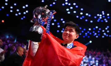 Zhao Xintong celebrates his world championship win after beating Mark Williams.