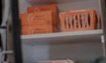 orange boxes on a shelf