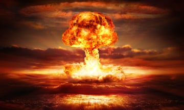 Explosion nuclear bomb in ocean testing of atomic bomb over ocean with mushroom clouds - red destroy