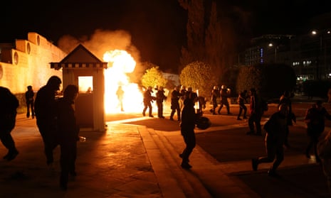 Athens: protesters clash with police during demonstration over 2023 train crash – video report