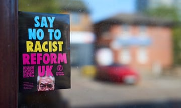 A poster declaring:"Say no to racist Reform UK" in a shop window in Runcorn town centre 48 hours ahead of the byelection